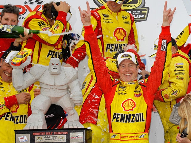 Kurt Busch celebrates in victory lane  
