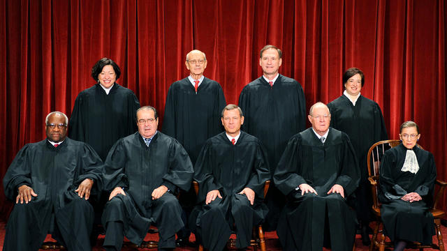 The justices of the U.S. Supreme Court sit for their official photograph Oct. 8, 2010, at the Supreme Court in Washington. From left to right, front row: Associate Justice Clarence Thomas, Associate Justice Antonin Scalia, Chief Justice John G. Roberts, A 