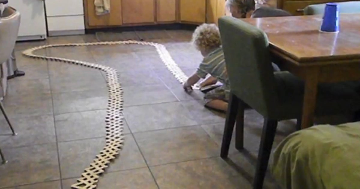 1,000 popsicle sticks explode in a domino effect CBS News