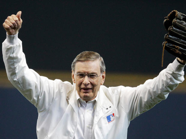 Bud Selig reacts after throwing out the ceremonial first pitch  