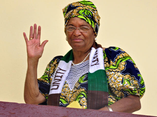Liberian President Ellen Johnson Sirleaf waves at her home in the city of Monrovia, Liberia, Oct 7, 2011. Africa's first democratically elected female president, a Liberian campaigner against rape and a woman who stood up to Yemen's autocratic regime won the Nobel Peace Prize in recognition of the importance of women's rights in the spread of global peace. The 10 million kronor ($1.5 million) award was split three ways between Sirleaf, women's rights activist Leymah Gbowee also from Liberia and democracy activist Tawakkul Karman of Yemen, the first Arab woman to win the prize. 