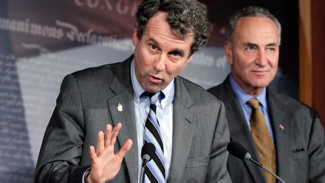 Sen. Sherrod Brown, D-Ohio, left, and Sen. Chuck Schumer, D-N.Y. 