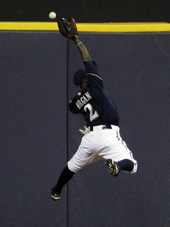 Nyjer Morgan can't catch a double off the bat of Albert Pujols 