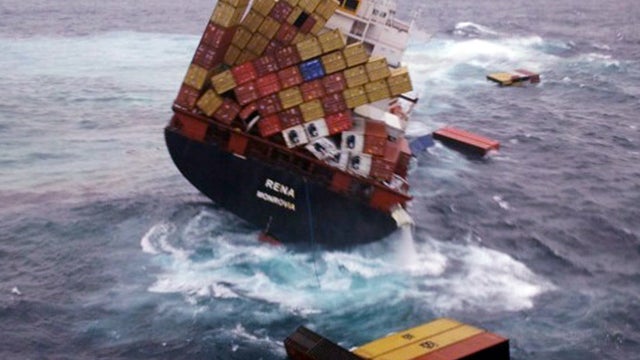 Shipping containers float Oct. 12, 2011, in the water around the cargo ship Rena that has been foundering since it ran aground Oct. 5, 2011, on the Astrolabe Reef about 14 miles from Tauranga Harbour, New Zealand, in this photo provided by Maritime New Ze 