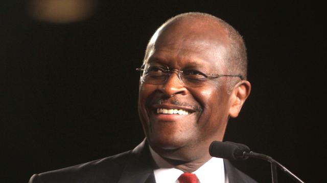 FILE - In this Friday, Sept. 23, 2011 file photo, Republican presidential candidate Herman Cain arrives onstage to address the Conservative Political Action Conference (CPAC) at the Orange County Convention Center in Orlando, Fla. Herman Cain thinks Rick  