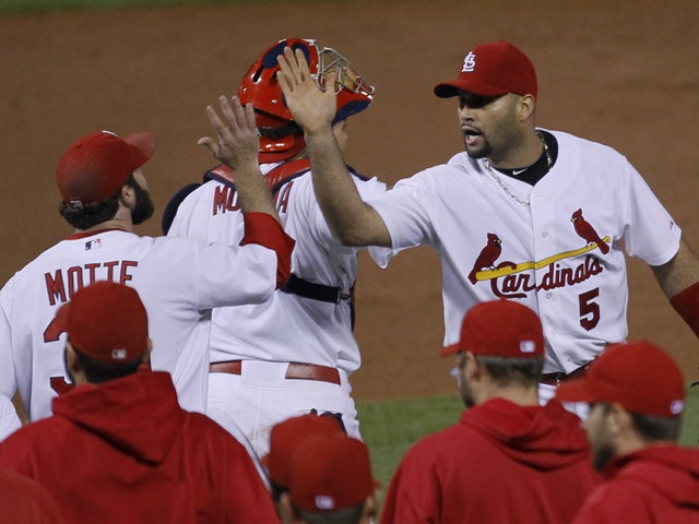 Albert Pujols celebrates with Jason Motte  