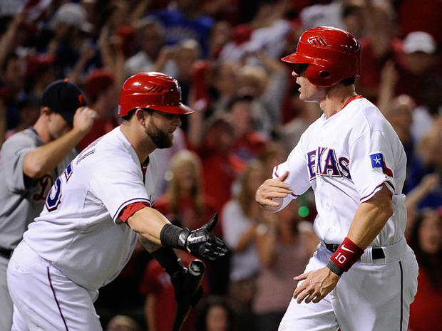 Michael Young celebrates with Mike Napoli 