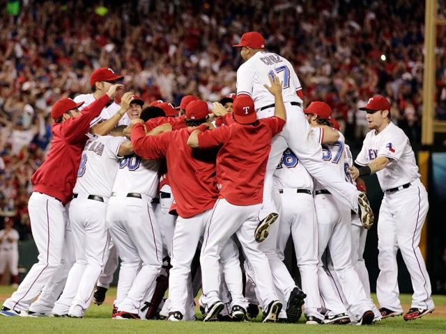 Nelson Cruz jumps on the crowd 