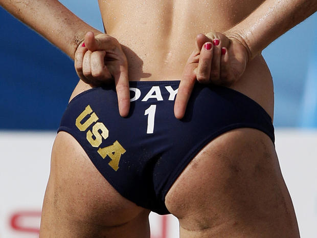 Emily Day gestures during a women's beach volleyball match 