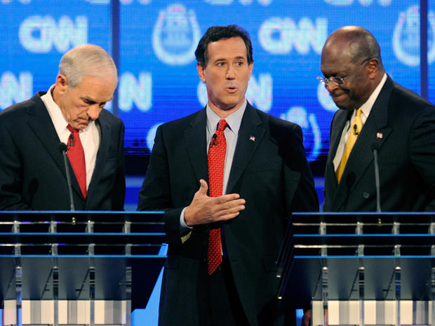 Ron Paul, Rick Santorum and Herman Cain 