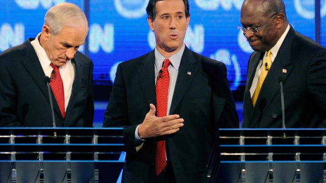 Ron Paul, Rick Santorum and Herman Cain  