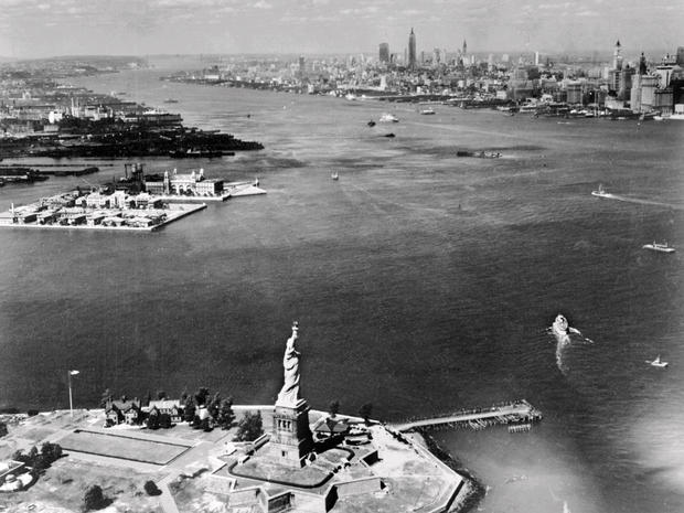 An aerial view of part of New York's Upper Bay shows a section of the New York and New Jersey shorelines and the Statue of Liberty July 20, 1951, in New York. 