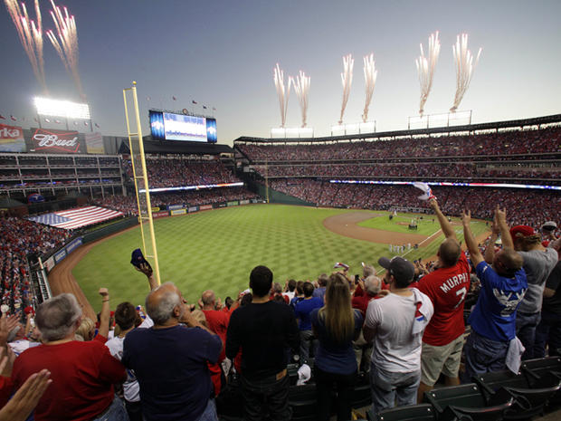 Fans cheer as fireworks are seen before Game 5  