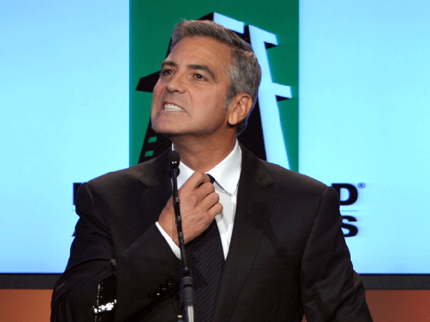 George Clooney accepts the Hollywood  Actors Award on Oct. 24, 2011, in Los Angeles. 