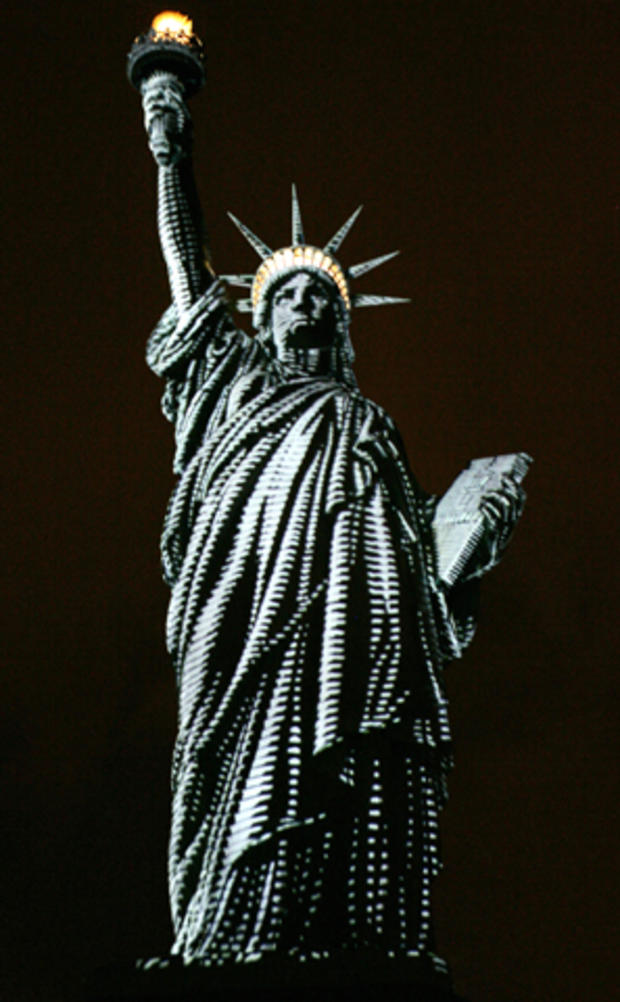 The Statue of Liberty is lit to show the contours of the sculpture during a special show by French Champagne maker Moet & Chandon Sept. 28, 2006, one month before the 120th anniversary of the statue's dedication. The usual floodlights were replaced for on 