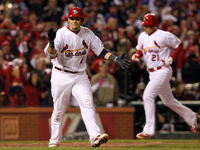 St. Louis Cardinals Albert Pujols celebrates after scoring off of a David  Freese triple against the Texas Rangers during the 9th inning of game 6 of  the World Series in St. Louis
