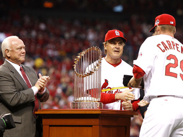 Chris Carpenter is presented with his World Series ring by Tony La Russa 