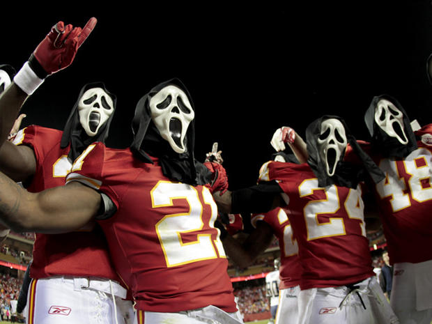 players wearing Halloween masks 