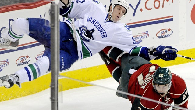 Dale Weise is upended by Cal Clutterbuck 