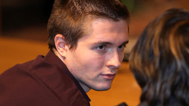 Raffaele Sollecito waits in Perugia's Court of Appeal Oct. 3, 2011, in Perugia, Italy, before hearing that he won his appeal against his murder conviction. 