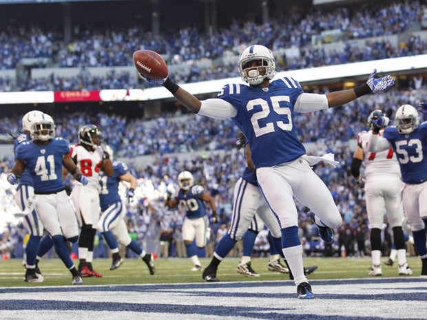 Jerraud Powers reacts after return an interception for a touchdown 