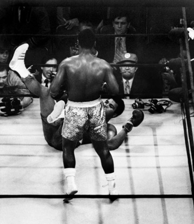 Joe Frazier knocks down Muhammad Ali 