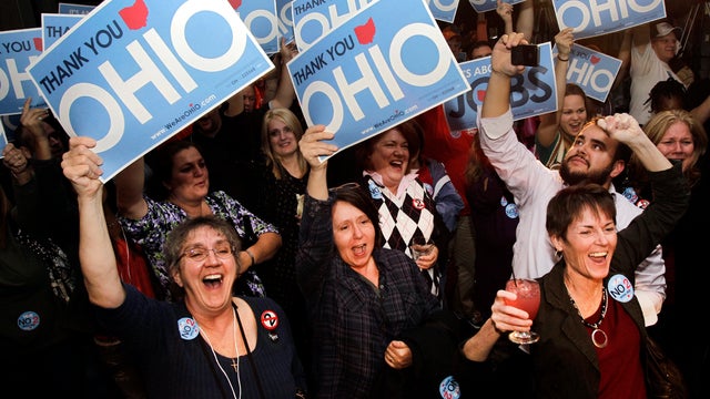 Opponents of an Ohio law that curbed collective bargaining rights cheer at a rally co-sponsored by the Cleveland Teachers Union and We Are Ohio in Cleveland as they hear election results sounding the law's repeal in the Ohio general election Nov. 8, 2011. 