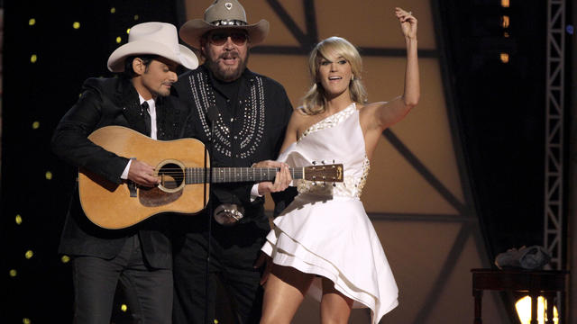 Blake Shelton, left, Hank Williams Jr., center, and Carrie Underwood during the 45th Annual CMA Awards in Nashville, Tenn., on Nov. 9, 2011.  