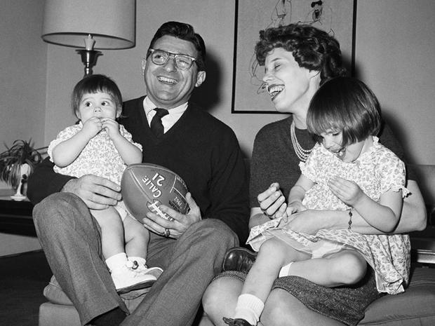 New Penn State head football coach Joe Paterno poses with his family 