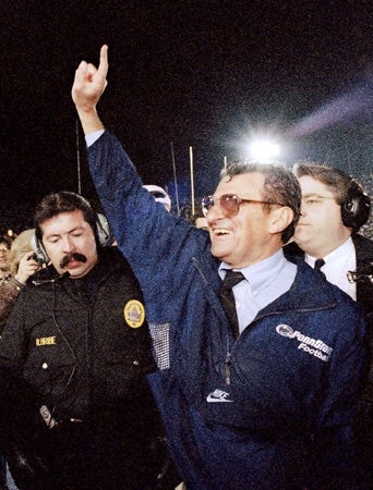 Joe Paterno smiles as he celebrates his team's victory  