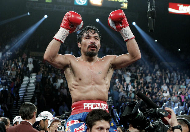 Manny Pacquiao celebrates after his victory  