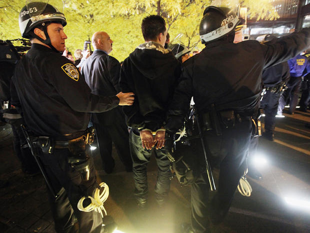 A protester is arrested after re-entering Zuccotti Park 
