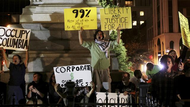 Occupy Columbia protesters sing together minutes before being arrested 