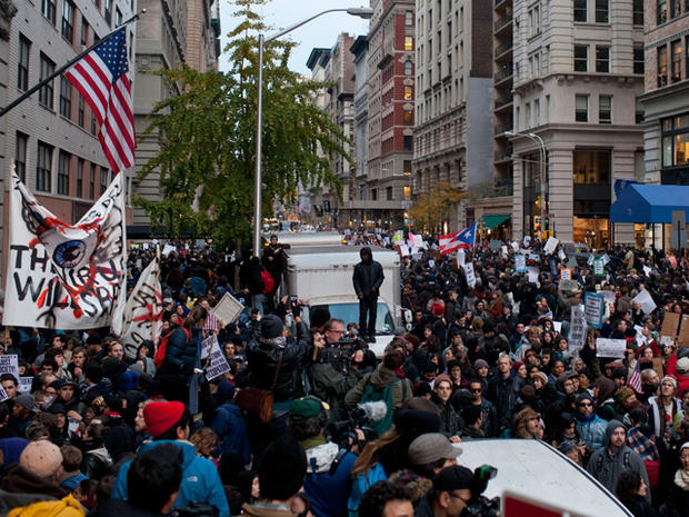 Protesters affiliated with the Occupy Wall Street movement crowd the intersection of 5th Avenue and West 14th Street in New York City Nov. 17, 2011. 