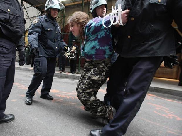 A protester affiliated with Occupy Wall Street is arrested a few blocks from the New York Stock Exchange Nov. 17, 2011, in New York City. 