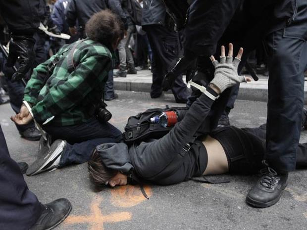 Police officers arrest demonstrators affiliated with the Occupy Wall Street movement Nov. 17, 2011, in New York. 