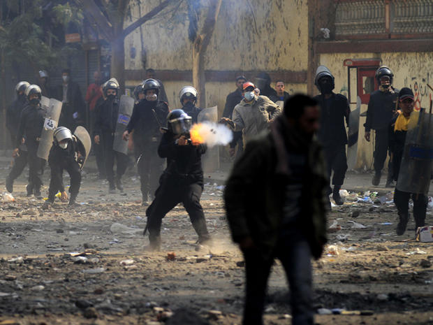 Police fire tear gas during clashes with protesters 
