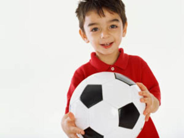 2/10/12 – Family &amp; Pets - Family Fun Guide to Port Discovery Children's Museum- Kid with soccer ball 