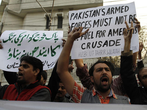 Pakistani protesters rally to condemn a NATO airstrike on Pakistani troops 