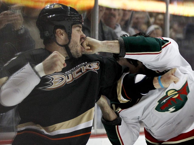 Brad Staubitz  lands a punch on Jean Francois Jacques 