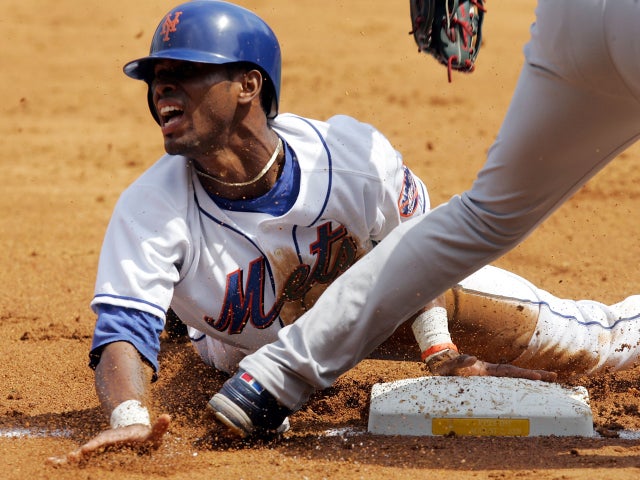 Jose Reyes slides safely 