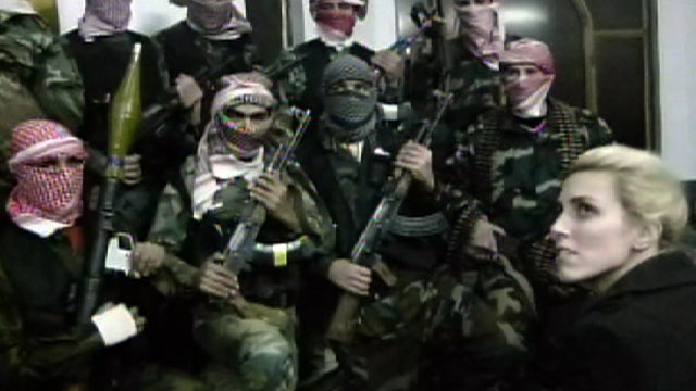 Members of the Free Syrian Army speak with CBS News correspondent Clarissa Ward in Damascus.  They say they're former Syrian soldiers who have decided to take up arms against the Assad regime. 