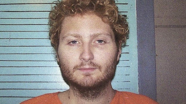 In this photo released by the Oklahoma State Bureau of Investigation, Kevin Sweat is pictured in a booking photo. First Degree Murder charges were filed Friday against 25-year-old Sweat for the June 2008 murders of 13-year-old Taylor Placker and 11-year-o 