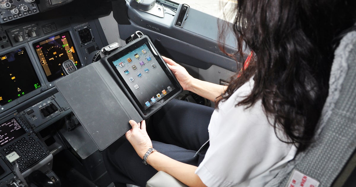 Tablet restrictions on airplanes may be eased soon CBS News