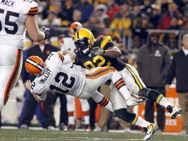 PITTSBURGH, PA - DECEMBER 8: James Harrison #92 of the Pittsburgh Steelers tackles Colt McCoy #12 of the Cleveland Browns during the game on December 8, 2011 at Heinz Field in Pittsburgh, Pennsylvania. The Steelers won 14-3. (Photo by Justin K. Aller/Getty Images) 
