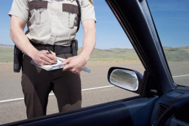 CHP writing speeding ticket 