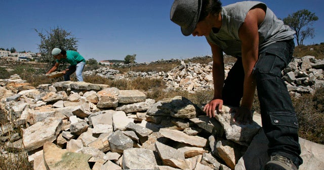 Israel rejects criticism of settlements - CBS News