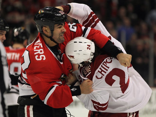 Jamal Mayers fights with Kyle Chipchura  