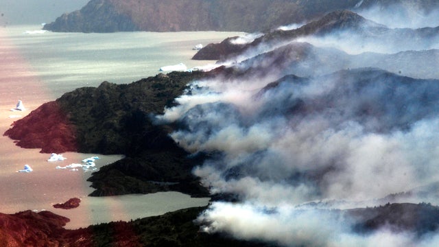 Smoke rises from several areas of Torres del Paine National Park in Torres del Paine, Chile, Dec. 30, 2011, in this handout photo released by Gobernacion de Magallanes. 