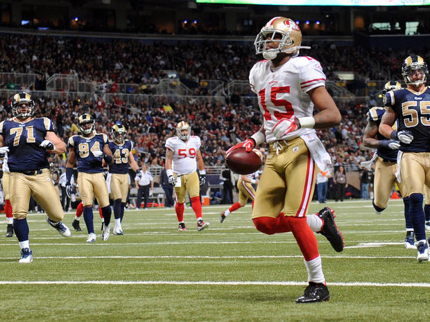 Michael Crabtree jogs into the end zone for a touchdown  
